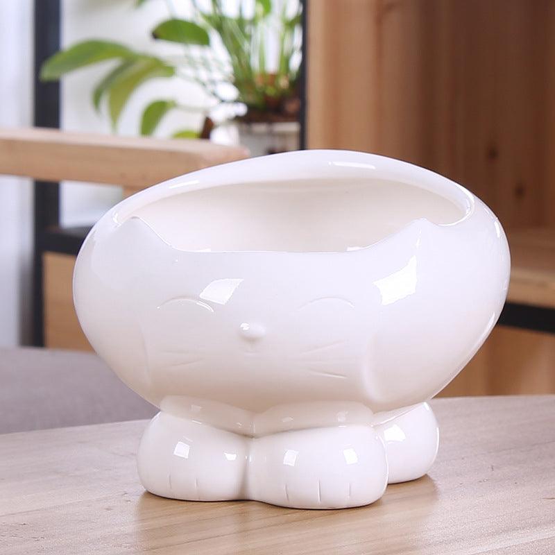 Pet Oasis: Resin Cat Feeder And Water Dispenser